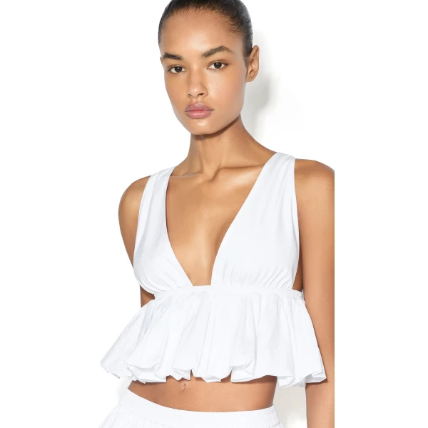 Alaïa Openwork Cotton Peplum Top - ALAÏA Tops - Laser Cut Luxury - Shop at Luxury Shoes 