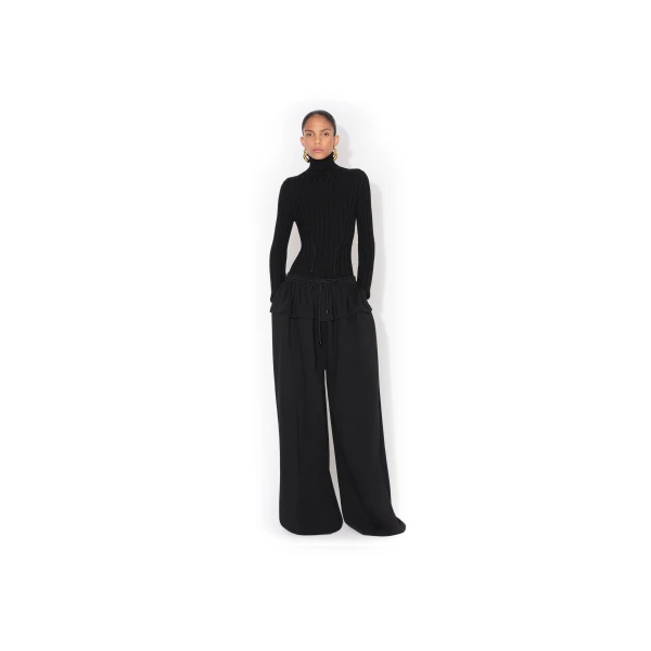 Alaïa Peplum Fleece Pants - ALAÏA Pants - Laser Cut Luxury - Shop at Luxury Shoes 