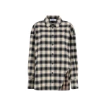 The Attico Sand and black shirt