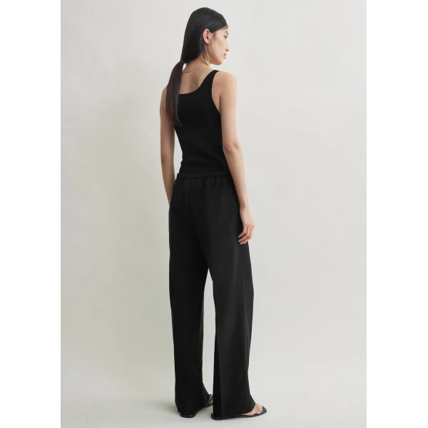Toteme Fluid drawstring trousers in Black, view 4