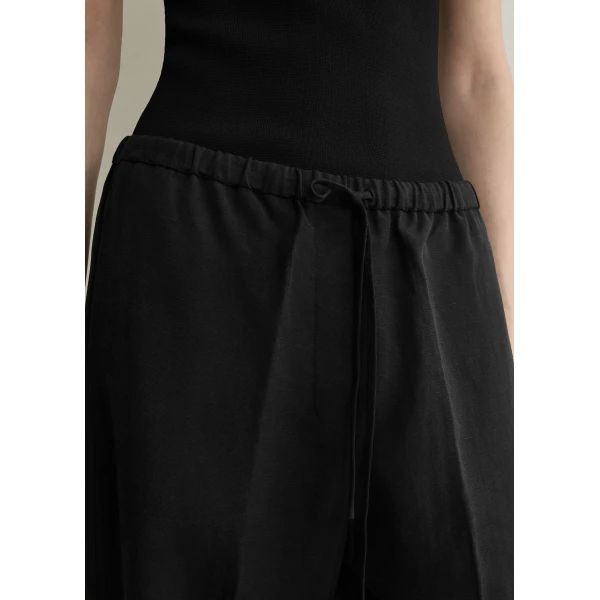 Toteme Fluid drawstring trousers in Black, view 5
