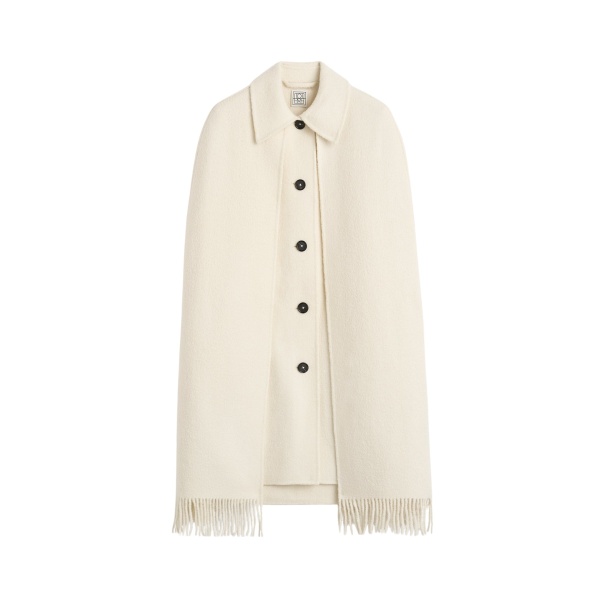 Totême Fringe cape coat in Winter white - Jackets - Scandinavian Minimalist Luxury at Luxury Shoes 