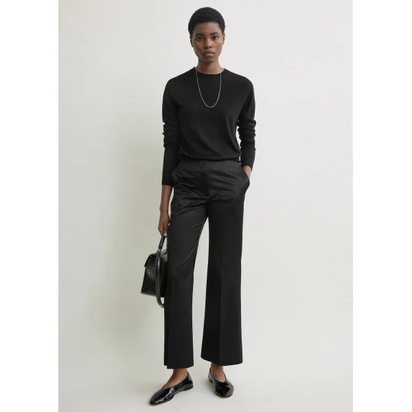 Toteme Kick flare raw-edge trousers in Black, view 2
