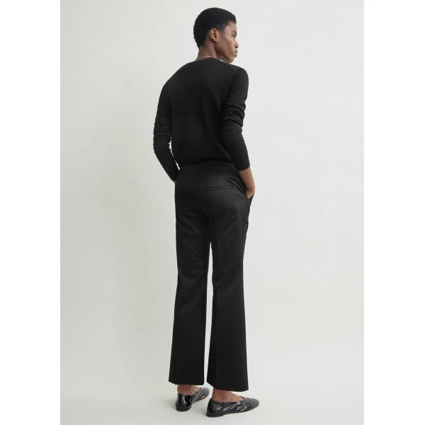 Toteme Kick flare raw-edge trousers in Black, view 3