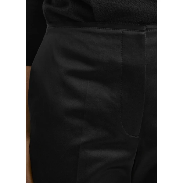 Toteme Kick flare raw-edge trousers in Black, view 5