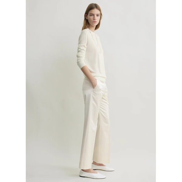 Toteme Kick flare raw-edge trousers in Stone, view 3