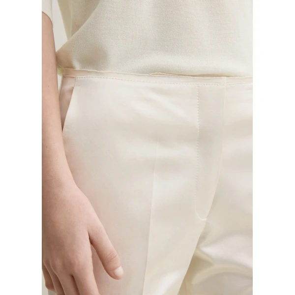 Toteme Kick flare raw-edge trousers in Stone, view 6