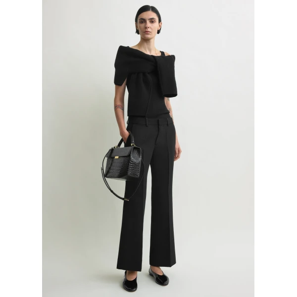 Toteme Kick flare trousers in Black, view 2