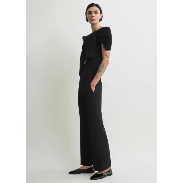 Toteme Kick flare trousers in Black, view 3
