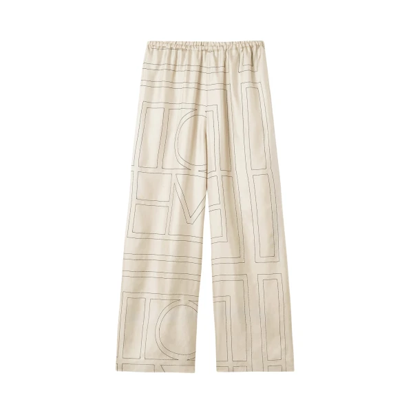 Toteme Monogram silk pj bottoms ivory in Ivory monogram