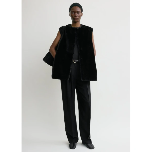 Toteme Plush shearling vest in Black, view 2