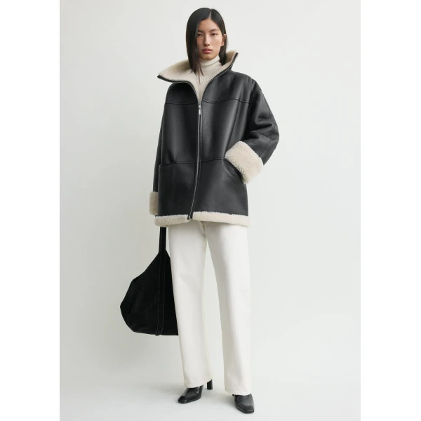 Toteme Signature shearling jacket in Black / Off-white, view 2