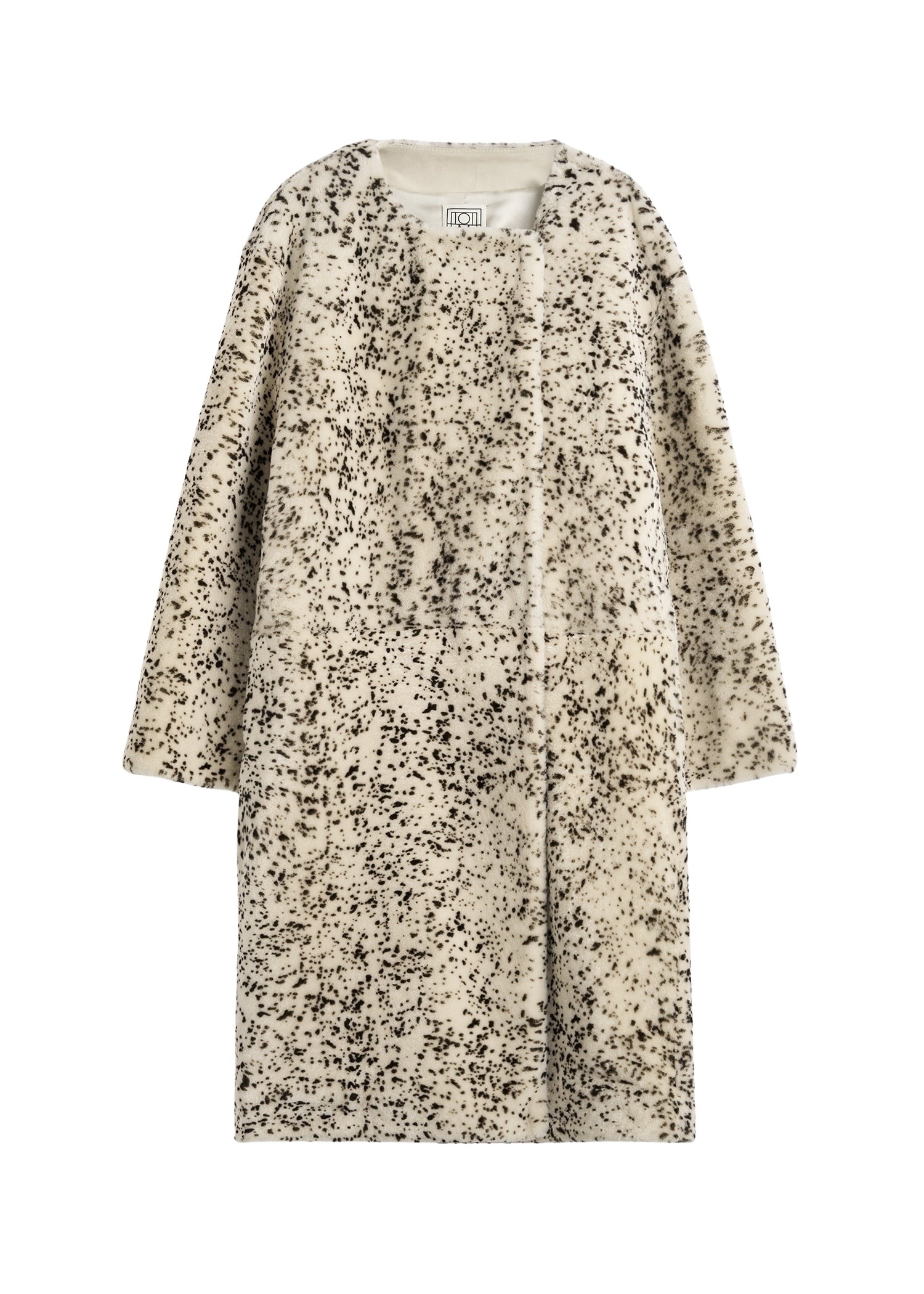Totême Stracciatella shearling coat black/white in Black-white - Coats - Scandinavian Minimalist Luxury at Luxury Shoes 