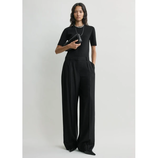 Toteme Wide flannel trousers in Black, view 3