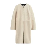 Toteme Zipped teddy shearling coat in Cream
