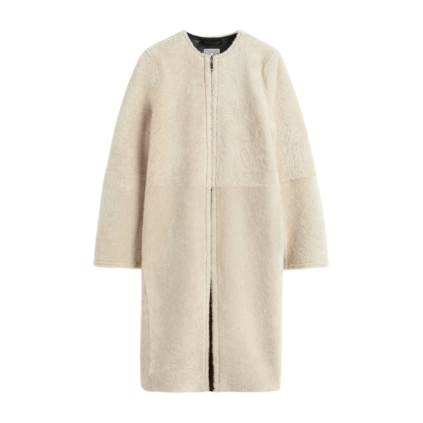 Toteme Zipped teddy shearling coat in Cream