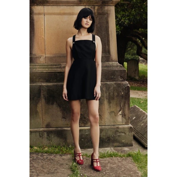 Macgraw Cross Back Apron Dress in Black, view 2