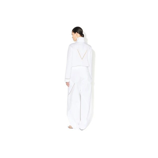 white designer trousers
