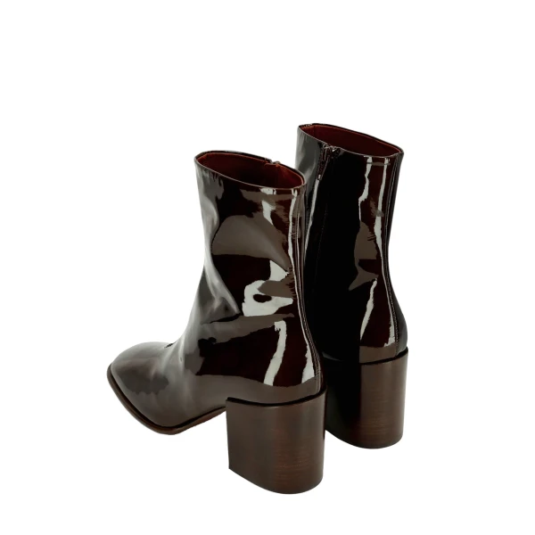 Heeled leather boots in Olive - Image 4