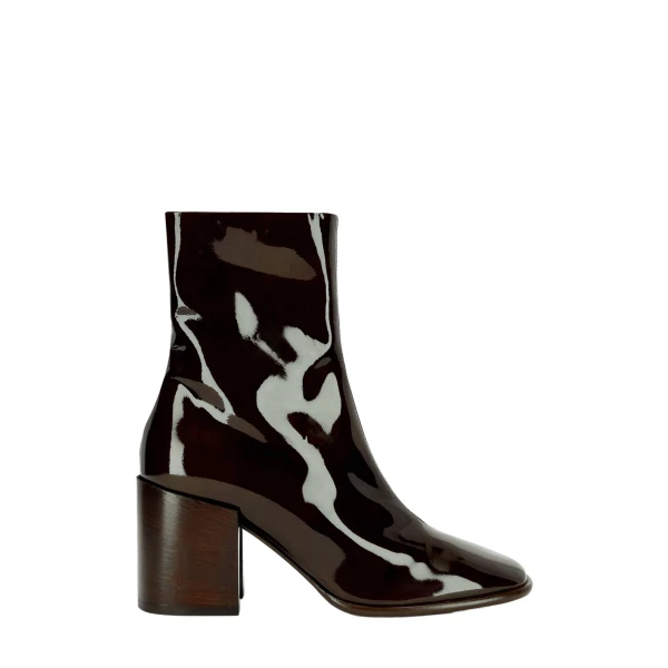Heeled leather boots in Olive