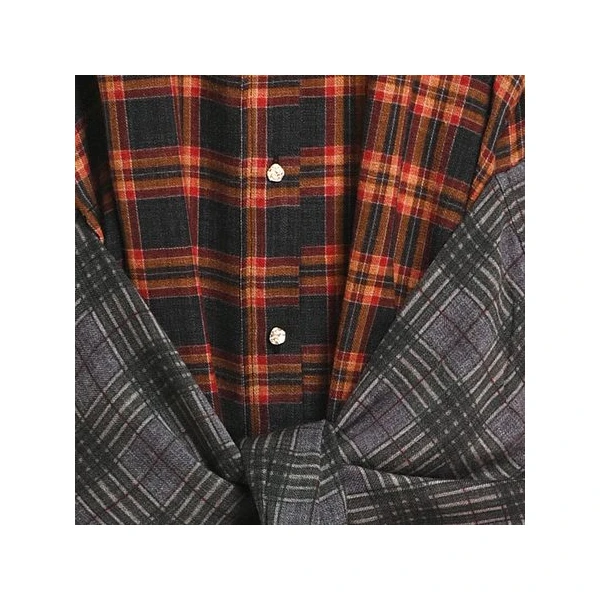 black and brown checked oversized shirt dress with sleeves tied at the waist