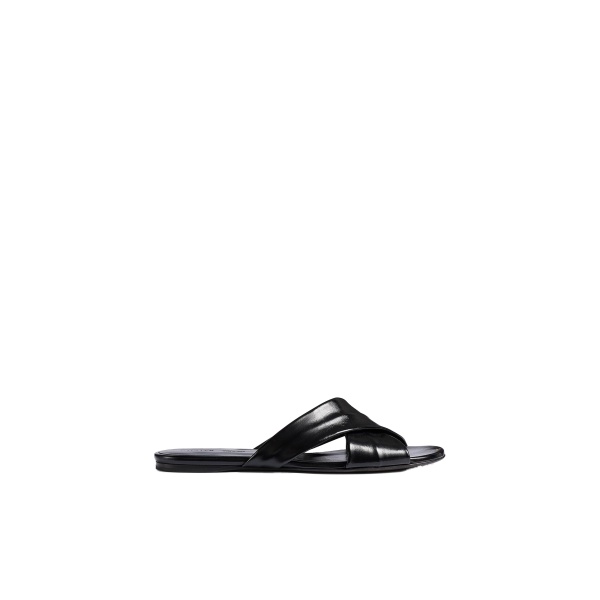 Khaite Liria Flat Sandal in Black Glazed Leather