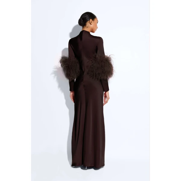 satin tab gown with feathers