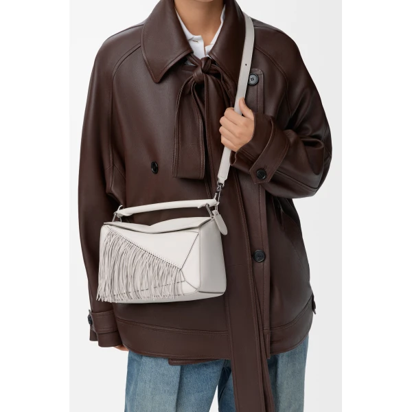 Loewe Fringe small Puzzle bag in classic calfskin, Soft White/Light Ghost | Shoulder & Crossbody Bags | Luxury Shoes 
