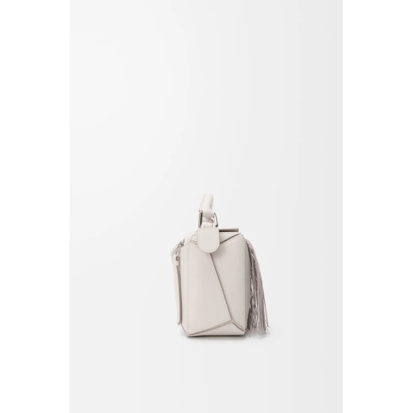 Loewe Fringe small Puzzle bag in classic calfskin, Soft White/Light Ghost | Shoulder & Crossbody Bags | Luxury Shoes 