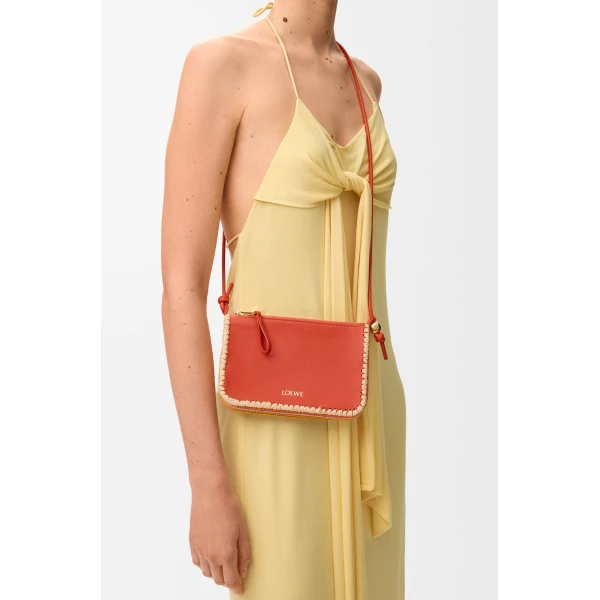 Loewe Rio pouch in classic calfskin and raffia, Deep Saffron | Clutch Bags | Luxury Shoes 