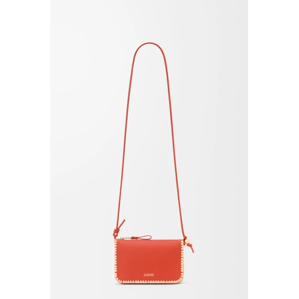 Loewe Rio pouch in classic calfskin and raffia, Deep Saffron | Clutch Bags | Luxury Shoes 