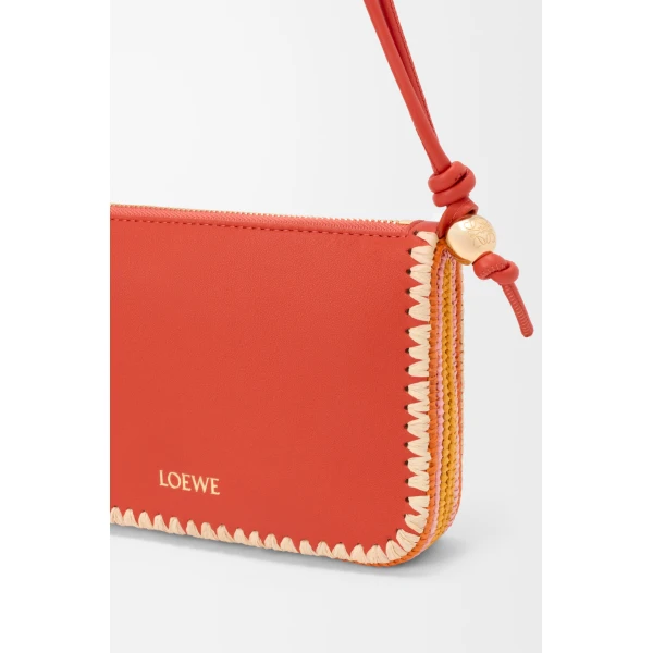 Loewe Rio pouch in classic calfskin and raffia, Deep Saffron | Clutch Bags | Luxury Shoes 