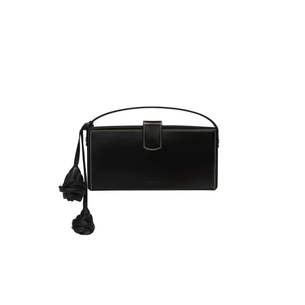 Apolonia bag in black leather with flower charm and contrast stitching