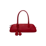 Magda Butrym Brigitte trapeze in red leather with flower charm