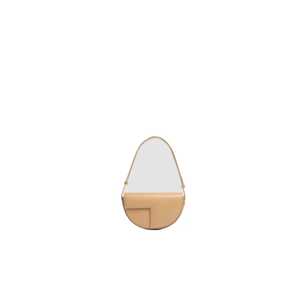 Le Petit Patou leather bag in Sand