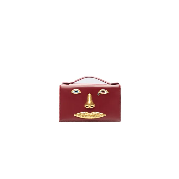 schiaparelli face clutch