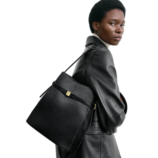 Belted pony hair bucket bag in Black - Image 2