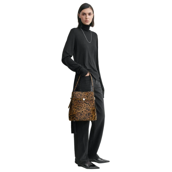 Belted pony hair bucket bag in Leopard - Image 3