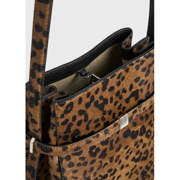 Belted pony hair bucket bag in Leopard - Image 6