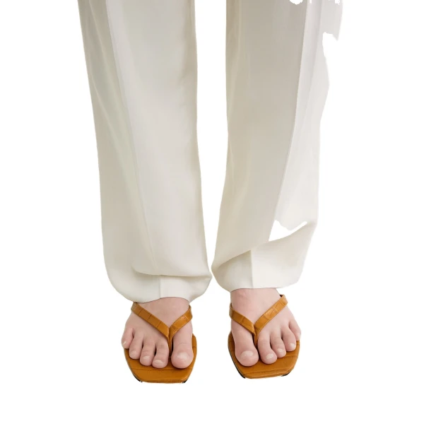 Croco-embossed flip flops in Tangerine - Image 2