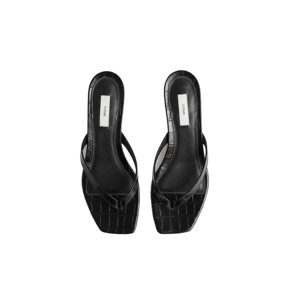 Croco-embossed heeled flip flops in Black - Image 4