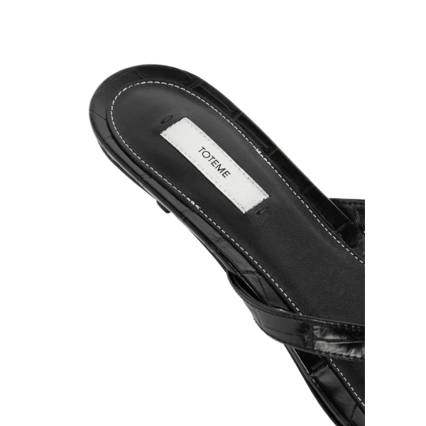 Croco-embossed heeled flip flops in Black - Image 5
