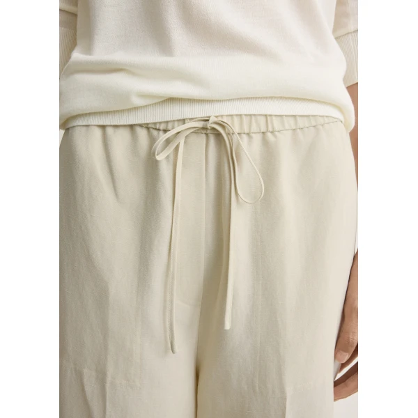 Toteme Fluid drawstring trousers in Talc, view 6