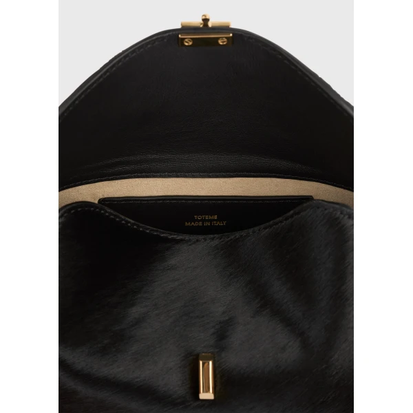 Mini T-Lock pony hair clutch in Black - Image 6