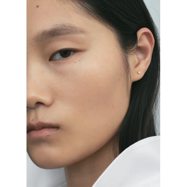 Mini diamond studs in Gold - Image 2