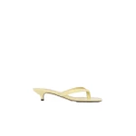 Toteme Naplack heeled flip flops in Buttercup