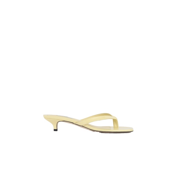 Toteme Naplack heeled flip flops in Buttercup