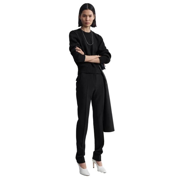 Toteme Slim stretch wool trousers in Black, view 3