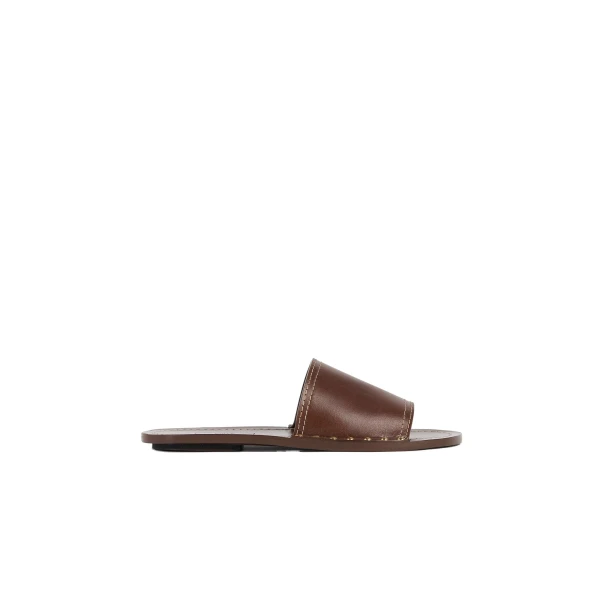 Studded leather slides in Sienna