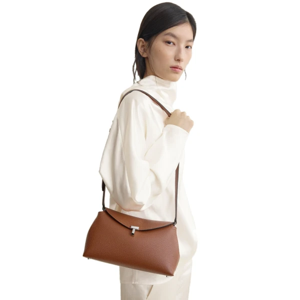 T-Lock grained-leather clutch in Sienna - Image 2